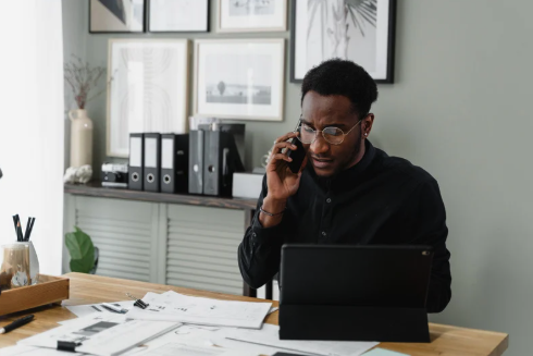 businessman on call with clients and  partners